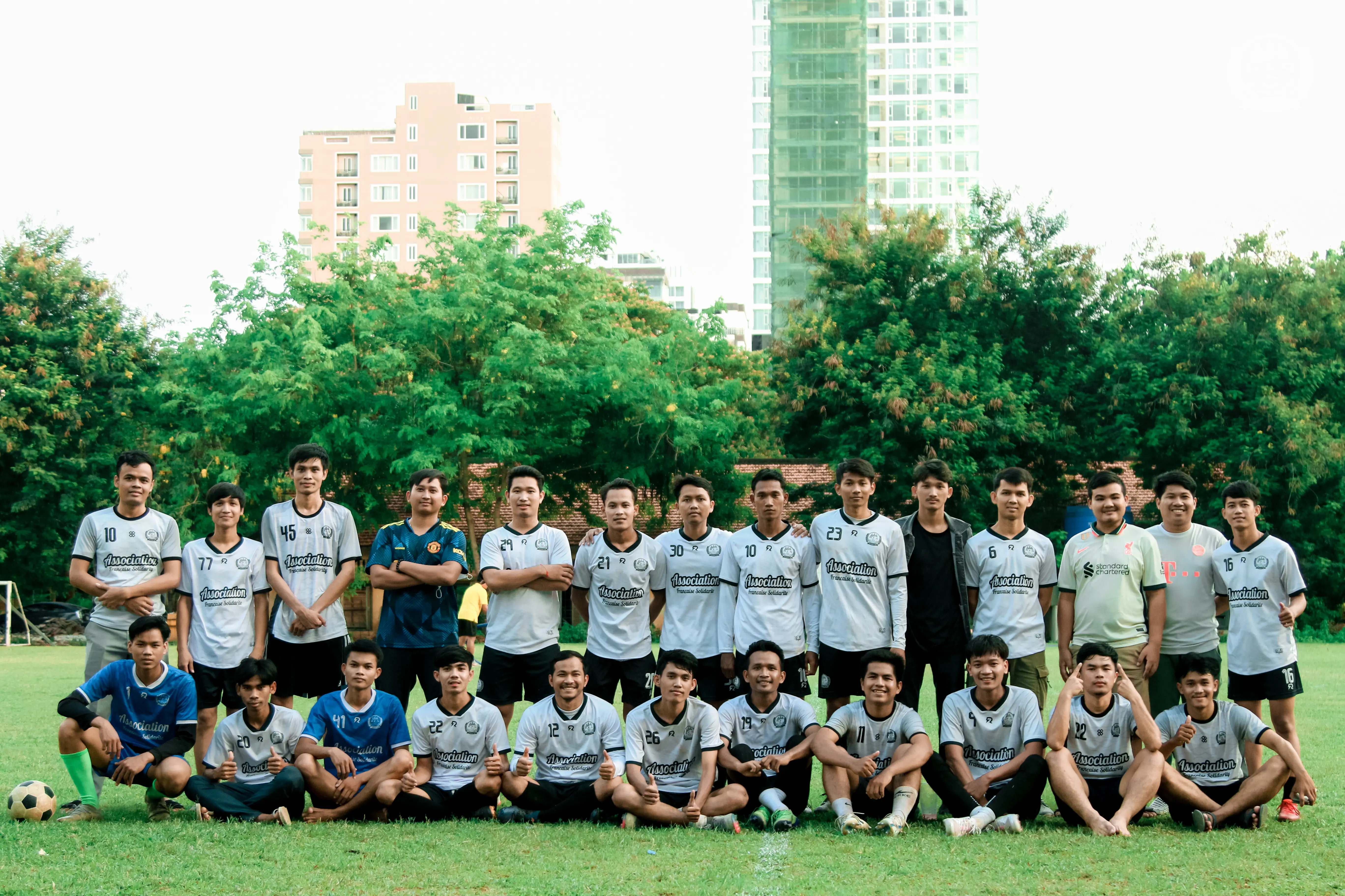 The AFS Football Club squad together on the pitch